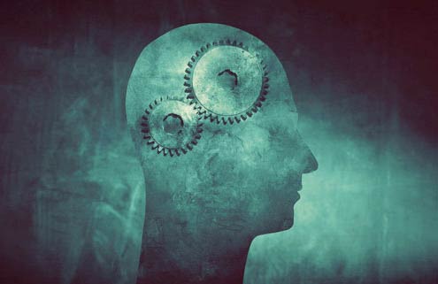 cogs turning in person's head greyscale